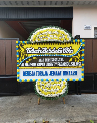 Papan Bunga Duka di Kareo